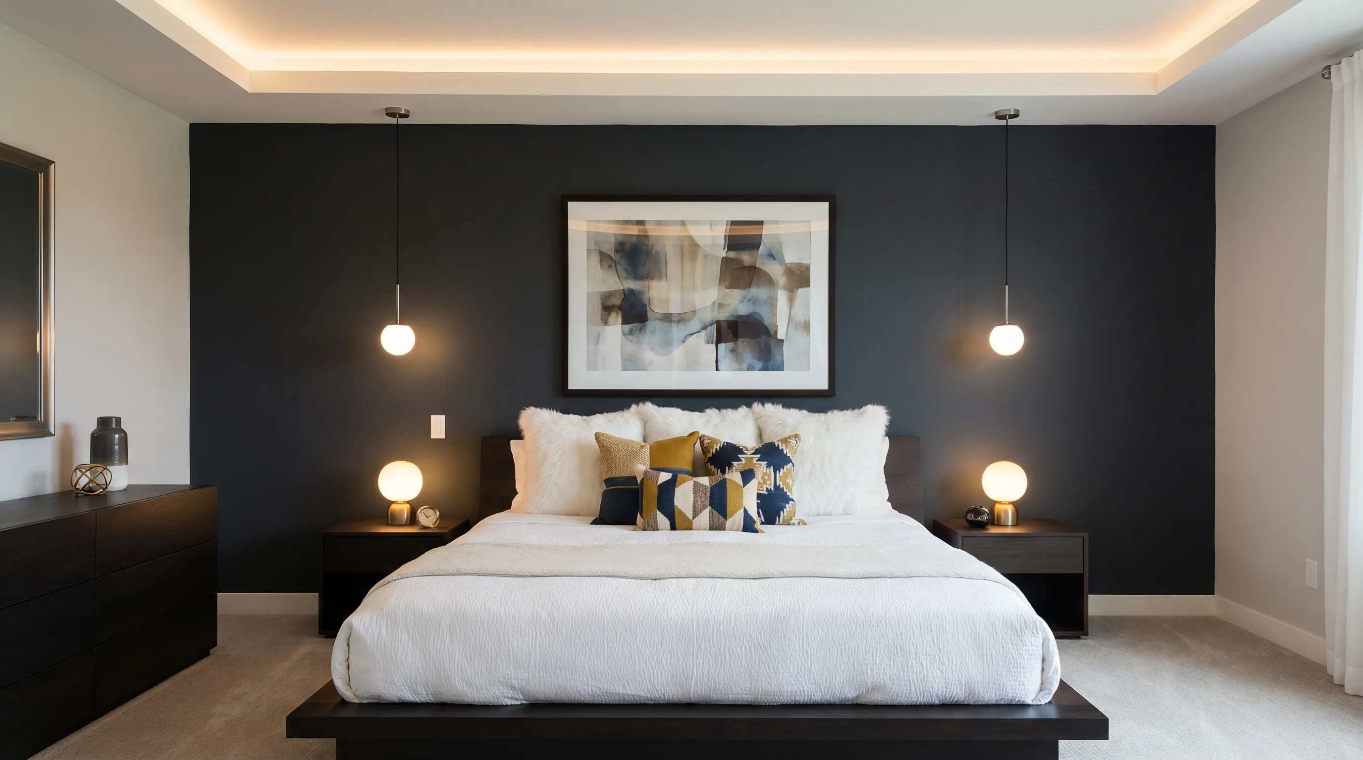 Contemporary cozy bedroom with dark accent wall and crisp white bedding